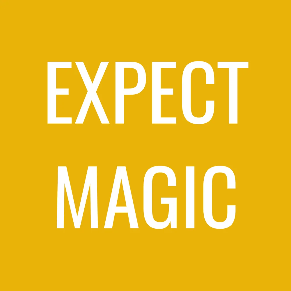 Zen wall clock: "Expect magic — yellow & white"