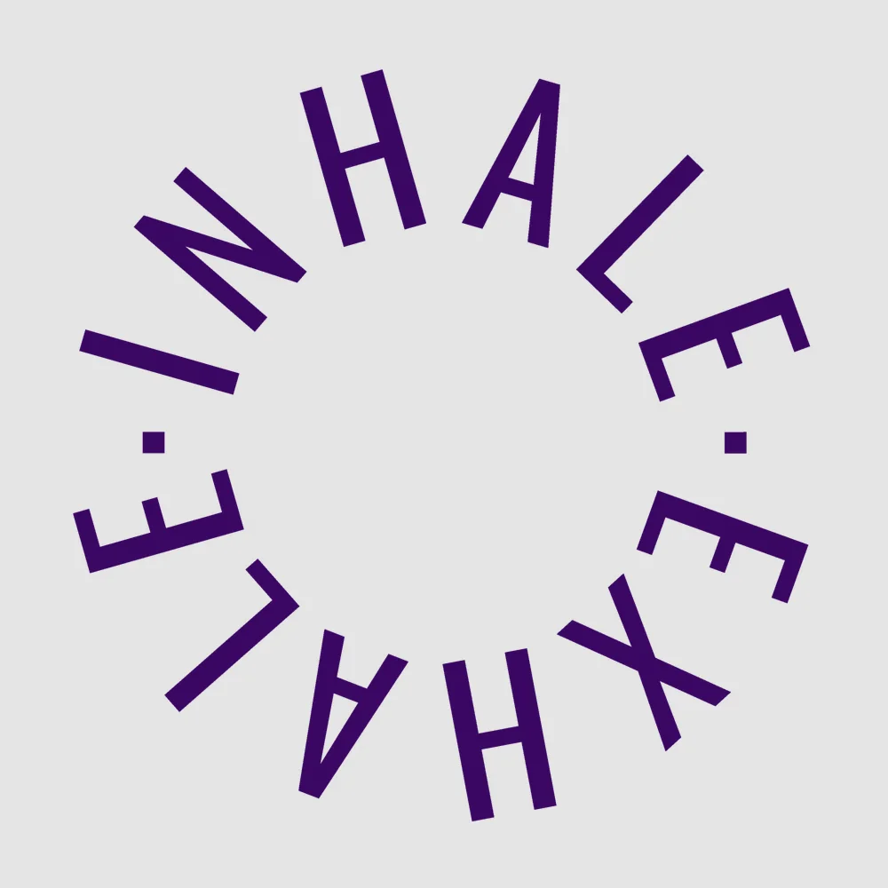 Zen wall clock: "inhale exhale"