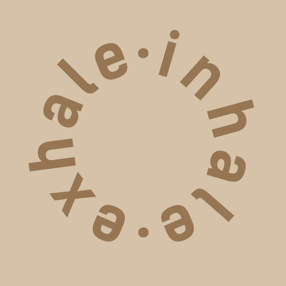 Zen wall clock: "inhale exhale"