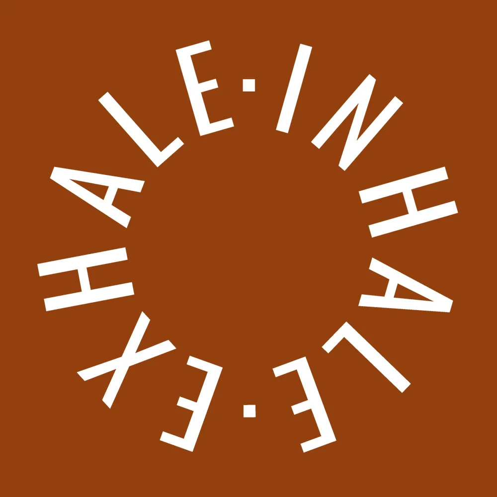 Zen wall clock: "inhale exhale"