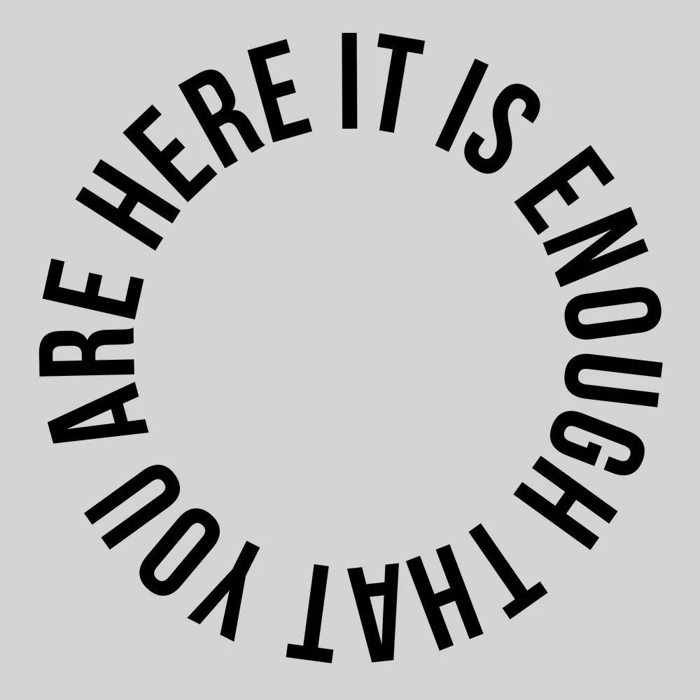 Zen wall clock: "It is enough that you are here — light neutral & black"
