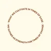 Zen wall clock: "what we cultivate in times of ease we gather as strength… — palest amber & dark amber"