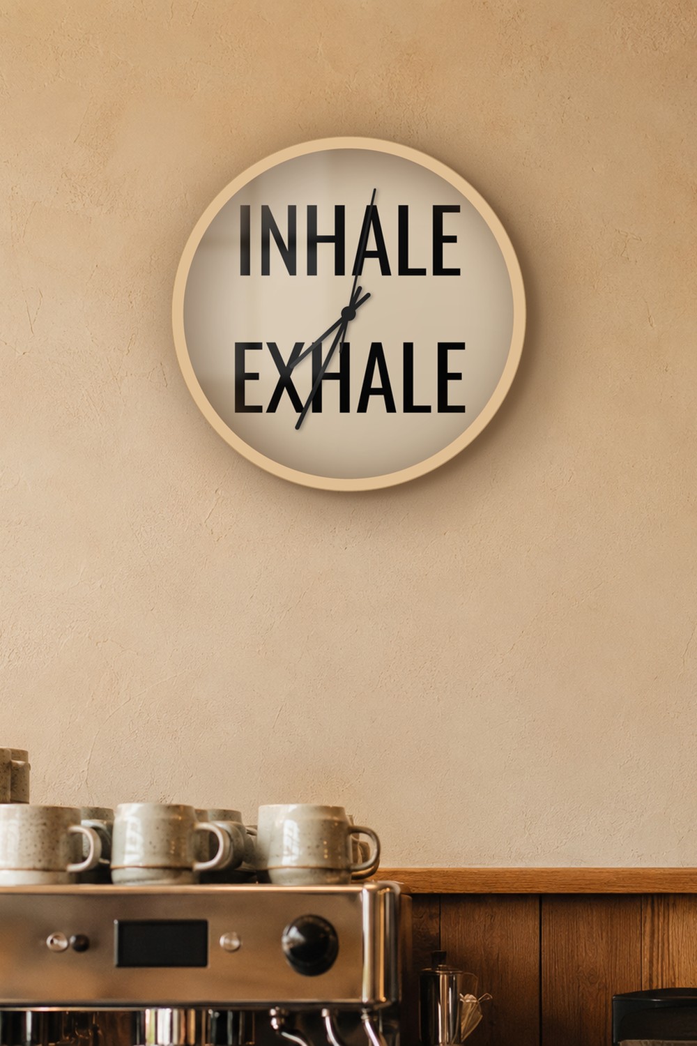 inhale exhale — light taupe & black on a wall