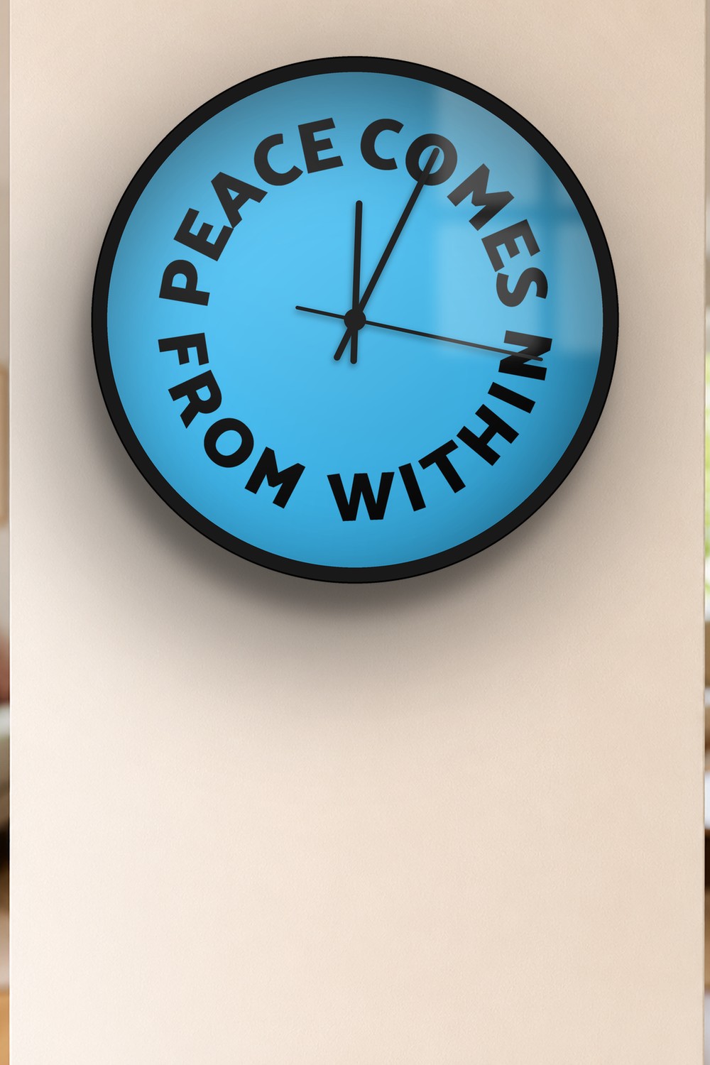 "peace comes from within" wall clock in light sky and black, on a wall