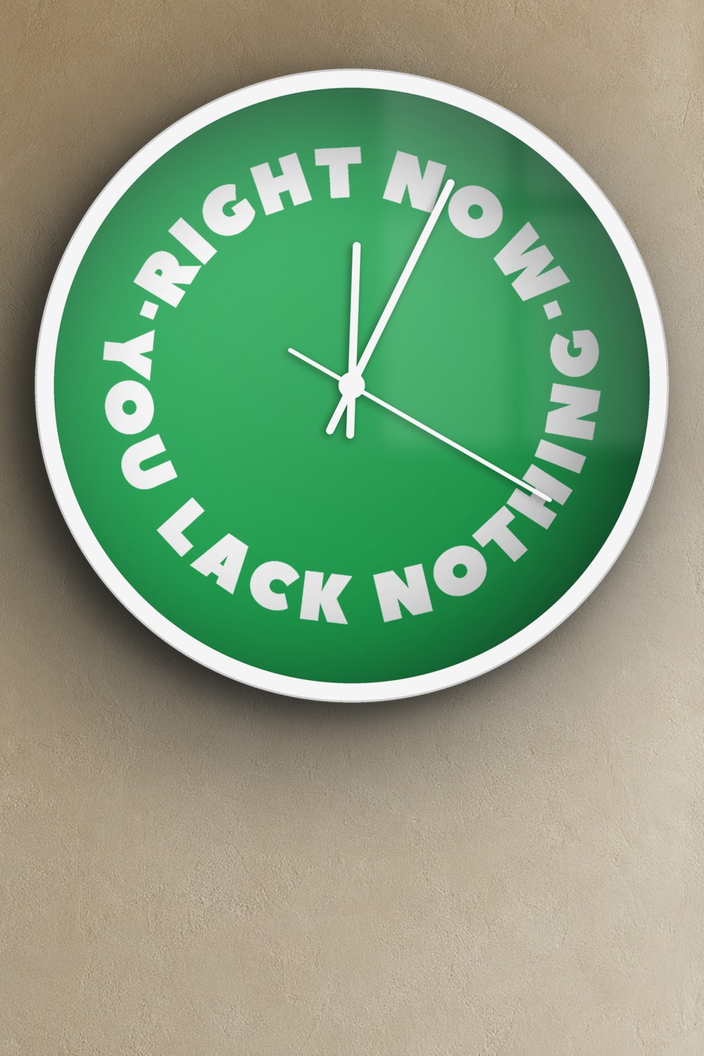"right now you lack nothing" wall clock in green and white, on a wall