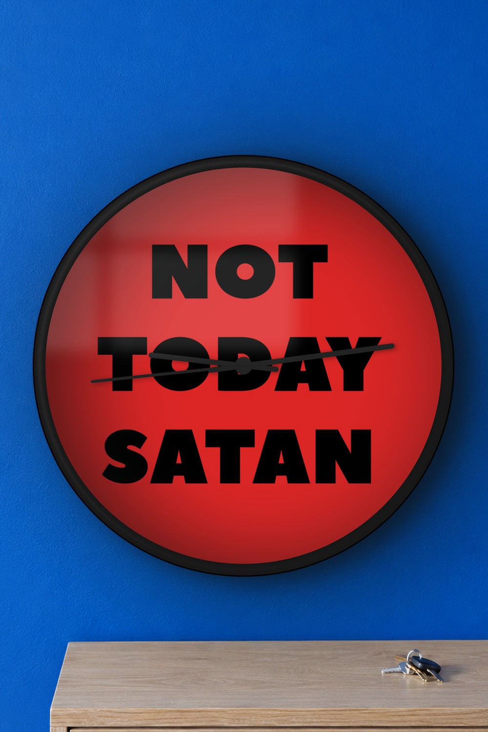 "Not today satan" wall clock in red and black, on a wall